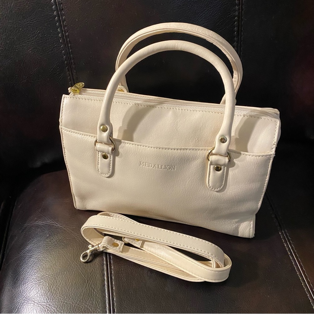 Medallion leather cream purse